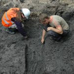 Graven in de graven, team van archeologen aan het werk bij de Grote Kerk